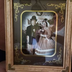 Buster's Old Time Photos - Her smile, him not