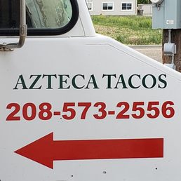 a white truck with a red arrow