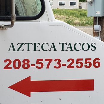 Azteca Tacos - a white truck with a red arrow - Mexican Near Me Azteca Tacos - a white truck with a red arrow - Mexican Near Me