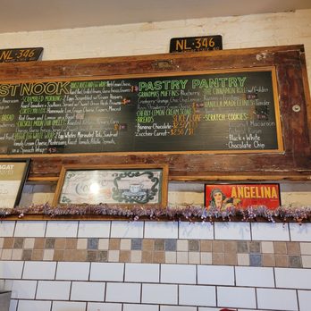 Catskill Bagels - a menu board and santa statues - Coffee & Tea Near Me - Brooklyn, New York Catskill Bagels - a menu board and santa statues - Coffee & Tea Near Me - Brooklyn, New York