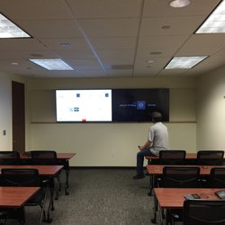 AVID Resources - 4K TV Custom TV Installation in Corporate Conference Room.  Dual monitors to displace the same or different content on each screen.