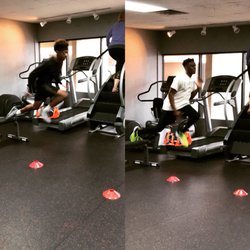 180 Physique - This is a photo of two track sprinters doing rear foot elevated plyometric jumps.