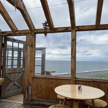 Finn's Pizza - a view of the ocean from inside a restaurant - Pizza Near Me - Homer, Alaska
