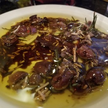 Milo's Cellar - Their complimentary dip made with olives, olive oil, parses an cheese, rosemary and balsamic paired with their warm foccacia is to die for! - Wine Bars Near Me - Boulder City, Nevada Milo's Cellar - Their complimentary dip made with olives, olive oil, parses an cheese, rosemary and balsamic paired with their warm foccacia is to die for! - Wine Bars Near Me - Boulder City, Nevada