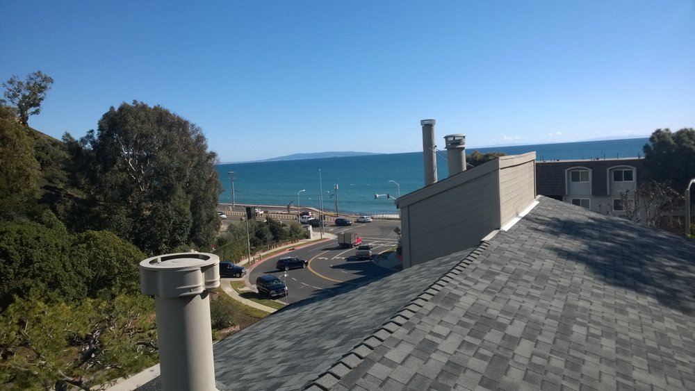 Slide of CJ West Roofing