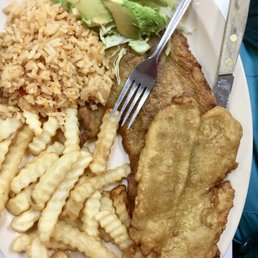 a plate of fish, rice, and vegetables a plate of fish, rice, and vegetables