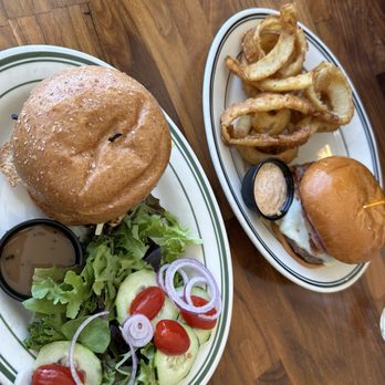 Maverick Jack's - San Mateo - Left: Soprano chicken with salad; Right: Outlaw burger - Burgers Near Me - San Mateo, California Maverick Jack's - San Mateo - Left: Soprano chicken with salad; Right: Outlaw burger - Burgers Near Me - San Mateo, California