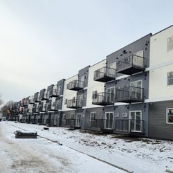 J Hempel Services - New steel siding installed on this apartment building.