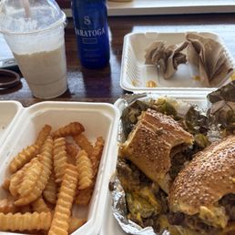 The raging bull, fries, vanilla bean shake, Saratoga Water The raging bull, fries, vanilla bean shake, Saratoga Water