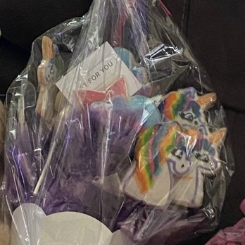 Cookies By Design - This was the bouquet that she received, some cookies were eaten already - Desserts Near Me - Plano, Texas