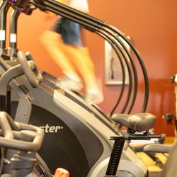 Ampersand Fitness - Treadmill section with members using the cardio machines.