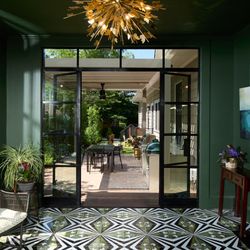City Garden Company - Compact backyard space  with patio, multi-function pergola, grilling area, decks, lawn and water feature.