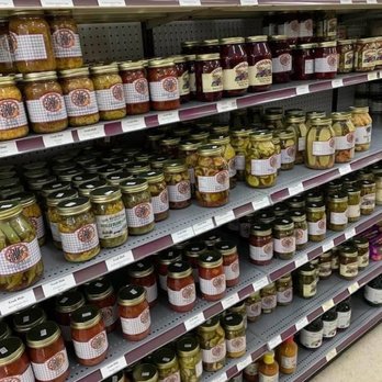 Grub Hub - jars of pickles on shelves in a grocery store - Delis Near Me - Monticello, Kentucky