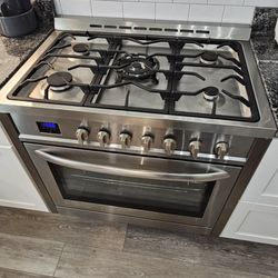 MiHome Property Inspections - We test the stovetop and oven for basic operation