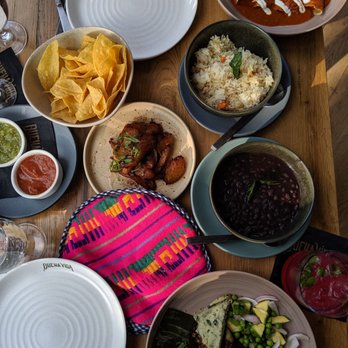Buena Vida - Rabbit barbacoa, beans & rice, plantains, duck enchiladas and super cute table setting - Mexican Near Me - Arlington, Virginia