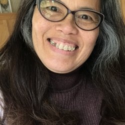 OrthoWorks - In the beginning. Wearing braces to close up gap - missing canine tooth (right side). Note: My natural gray is growing! Ha!!