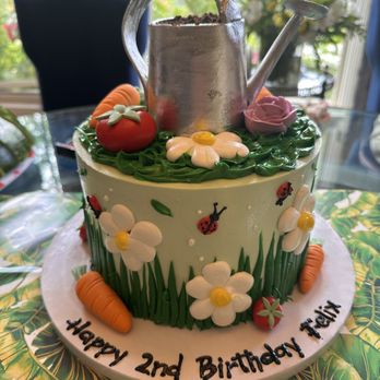 Simply Sweet Cakes - Beautiful cake and craftsmanship. Watering can is made out of buttercream - Cupcakes Near Me - Santa Ana, California Simply Sweet Cakes - Beautiful cake and craftsmanship. Watering can is made out of buttercream - Cupcakes Near Me - Santa Ana, California