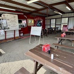 The Real Pit BBQ - Covered patio. This is the only seating area.