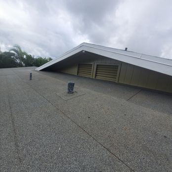Windward Skies Construction - New rolled roofing overlay and vent into crawl space. - Carpenters Near Me