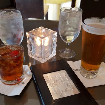 Deep Blu Seafood Grille - Drinks from the bar outside deep blu; $14 for a Maker's Manhattan and a $4 draft beer happy hour deal. - Seafood Near Me - Orlando, Florida Deep Blu Seafood Grille - Drinks from the bar outside deep blu; $14 for a Maker's Manhattan and a $4 draft beer happy hour deal. - Seafood Near Me - Orlando, Florida