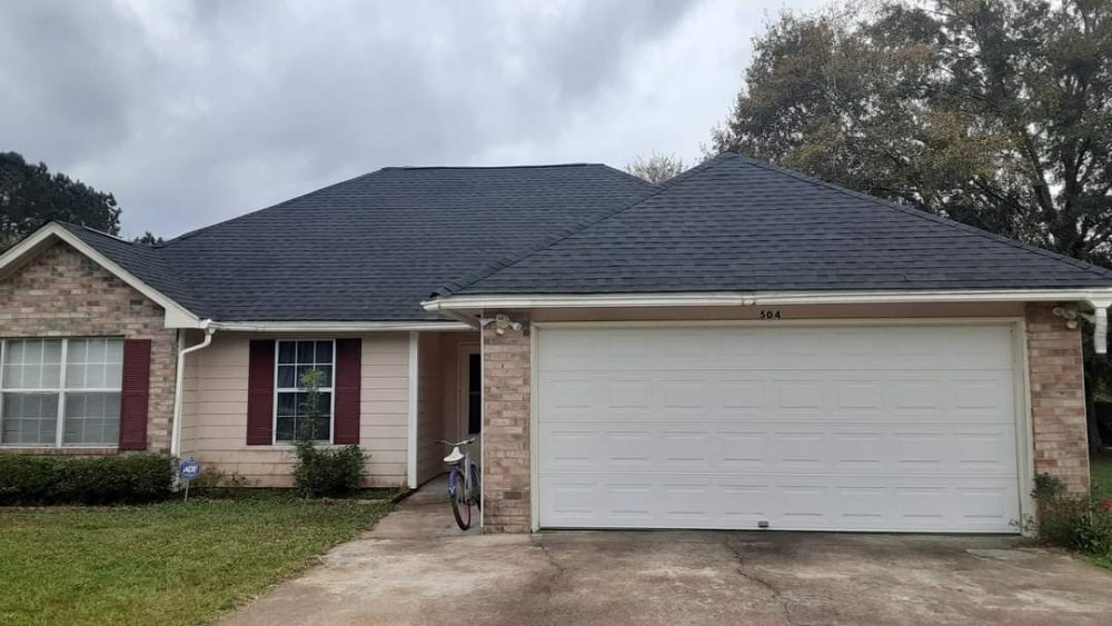 Slide of Hooker Roofing