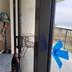 Beach Windows & Doors - doors off by 1/2 inch.  Won't seal shut