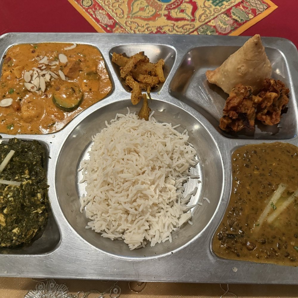 Everest Cuisine - $20 VEGETARIAN THALI FOR ONE PERSON (not pictured is the garlic naan!) - delicious! - Indian Near Me - Placentia, California Everest Cuisine - $20 VEGETARIAN THALI FOR ONE PERSON (not pictured is the garlic naan!) - delicious! - Indian Near Me - Placentia, California