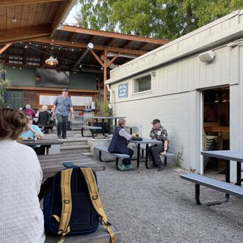 Hi-Top Tavern - More outdoor patio with covered seating wraps around the back and a TV - Bars Near Me - Portland, Oregon Hi-Top Tavern - More outdoor patio with covered seating wraps around the back and a TV - Bars Near Me - Portland, Oregon
