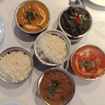 Bombay Darbar - Clockwise from 11 o'clock; mango curry chicken, chicken saag, chicken tikka masala and Dal Tadka. All absolutely delicious. - Indian Near Me - Miami, Florida