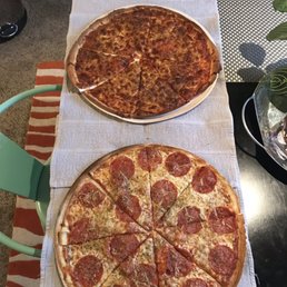 NYXL pizzas cooked . Very good .
