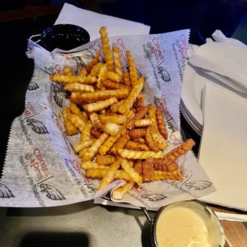 Chickie's & Pete's - Sweet potato fries and regular fries. Cheese dip for the French fries and syrup cinnamon dip for sweet potato fries - Seafood Near Me - Atlantic City, New Jersey Chickie's & Pete's - Sweet potato fries and regular fries. Cheese dip for the French fries and syrup cinnamon dip for sweet potato fries - Seafood Near Me - Atlantic City, New Jersey