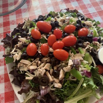 Papa's Restaurant - Supreme Salad on a large dinner plate - Pizza Near Me - Florence, Colorado Papa's Restaurant - Supreme Salad on a large dinner plate - Pizza Near Me - Florence, Colorado