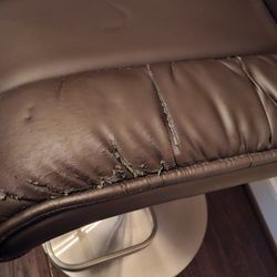 A-1-A Atlantic Moving & Storage - Ripped upholstery on chair.