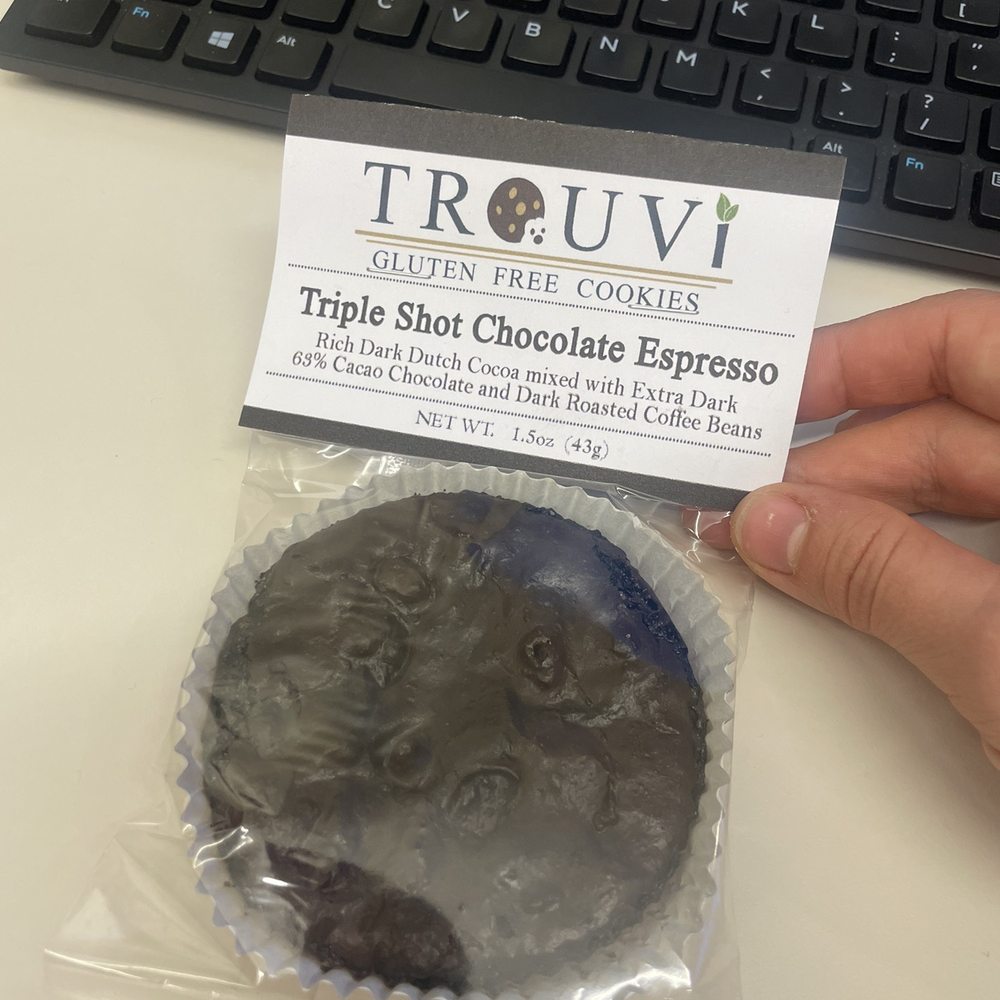 Trouvi Cookie Company - a hand holding a cookie - Desserts Near Me - Richardson, Texas Trouvi Cookie Company - a hand holding a cookie - Desserts Near Me - Richardson, Texas