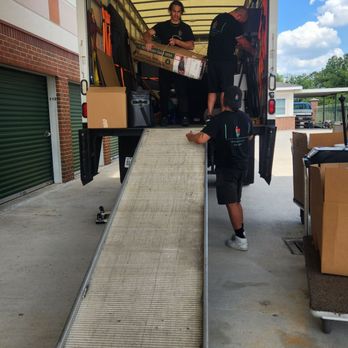 Fit Family Movers - Unloading a truck load - Movers Near Me
