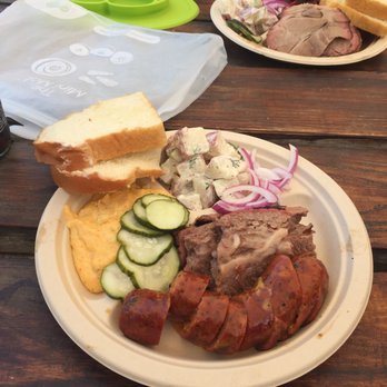 Micklethwait Craft Meats - Two meat plate: Brisket, Jalapeno Cheese Sausage, Jalapeno Cheese Grits and Potato Salad - Food Trucks Near Me - Austin, Texas