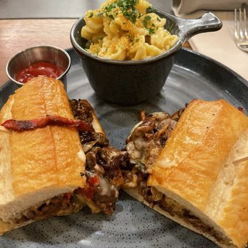 Former Saint Craft Kitchen and Taps - Bison Philly and Macaroni and Cheese - Bars Near Me - Denver, Colorado Former Saint Craft Kitchen and Taps - Bison Philly and Macaroni and Cheese - Bars Near Me - Denver, Colorado