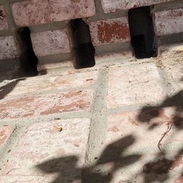 Oscar set a vent net to fill up a gap between the old vent and bricks.