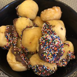 Sweetooth Donuts - They always give you glazed donut holes and have a whole variety of holes.