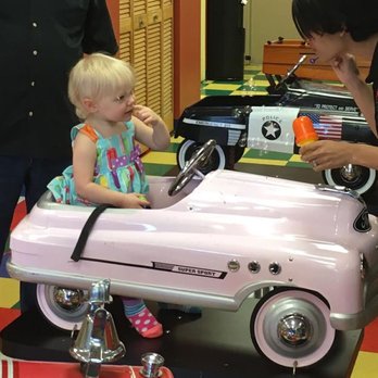 Klips & Giggles - Sitting in one of the many fun seat choices! - Barbers Near Me - Fleming Island, Florida Klips & Giggles - Sitting in one of the many fun seat choices! - Barbers Near Me - Fleming Island, Florida