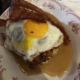 Chicken and waffles with an egg and bacon.  This was an absolute disaster of precooked, tasteless chicken.