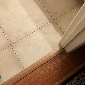 Brant Coley's Handyman Services - Custom piece Brant made for a smooth transition into bathroom. - Handyman Near Me