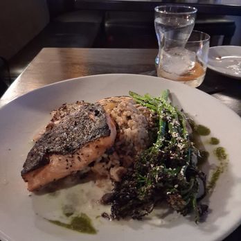 Cask & Cleaver Steakhouse - Salmon with rice pilaf and broccoli - Bars Near Me - Mount Vernon, Washington