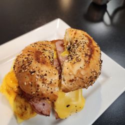 Smackin J's Deli & Grill - Egg, ham, everything bagel. Delicious. Fresh.