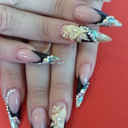 De Luxe Nail & Beauty