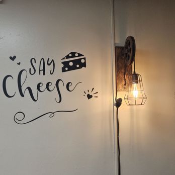 Branson Cheese Company - a light on a wall - Cheese Shops Near Me - Branson, Missouri