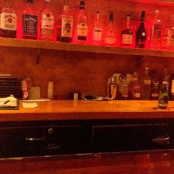 Sunnyday Tap - a bar with a television on the wall - New American Near Me - Chicago, Illinois