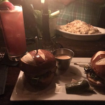 The Blind Rabbit - Pictured to the left is the Deadpool drink and my buffalo chicken sliders. You can also see my friend's duck mac n' cheese in the back. - Cocktail Bars Near Me - Anaheim, California The Blind Rabbit - Pictured to the left is the Deadpool drink and my buffalo chicken sliders. You can also see my friend's duck mac n' cheese in the back. - Cocktail Bars Near Me - Anaheim, California