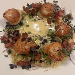 Millcreek Grille - Scallops with Orzo pasta with micro greens in butter sauce.