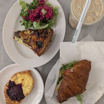 Tatte Bakery & Cafe | Newton Centre - Potato and leek quiche, sour cherry and cheese Danish, croissant sandwich, pistachio latte - Coffee & Tea Near Me - Newton, Massachusetts